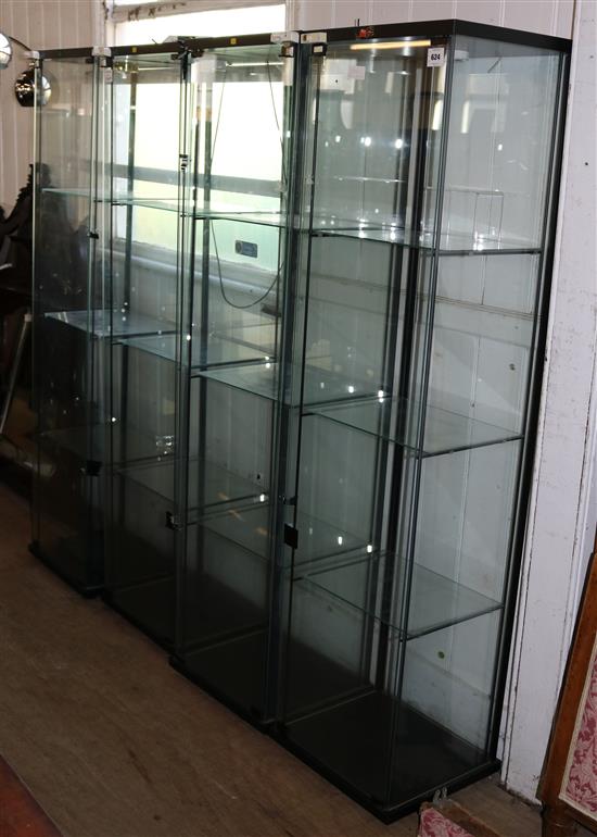 4 glazed display cabinets(-)